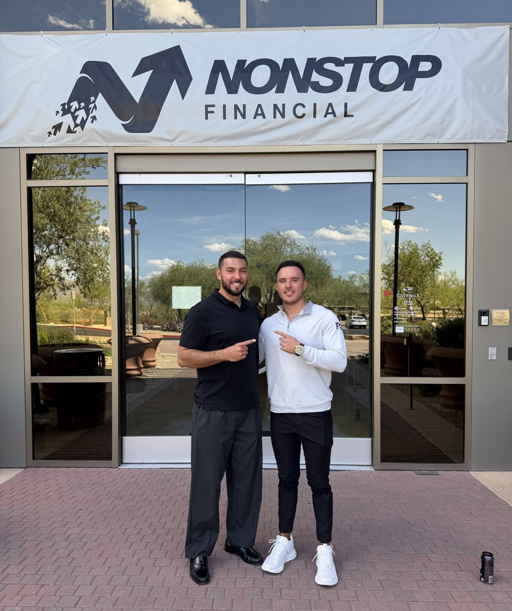 Peter Sifuentez of InsuraHire with Jay Maska in front of the Nonstop Financial office